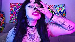 i love how deedee with tattoos and piercings fingers her big ass and tits while spitting cum in bra