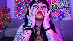 i love how deedee with tattoos and piercings fingers her big ass and tits while spitting cum in bra