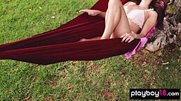 Glamorous big boobed naked Ukrainian beauty Gloria Sol resting in a hammock
