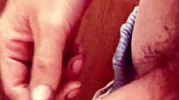 In a quiet homemade setting, an amateur explores solo pleasure with a focused handjob on his short foreskin.