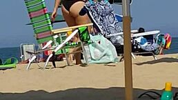 spying on this tiny 18+ beach slut in her bikini. her ass shakes as she walks candidly.