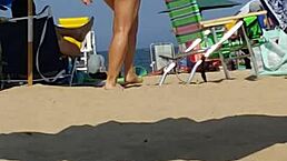 spying on this tiny 18+ beach slut in her bikini. her ass shakes as she walks candidly.