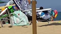 spying on this tiny 18+ beach slut in her bikini. her ass shakes as she walks candidly.