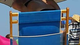 spying on this tiny 18+ beach slut in her bikini. her ass shakes as she walks candidly.