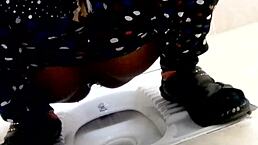 Girlfriend shares a quick pee moment with her friend in the bathroom