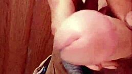 In a quiet homemade setting, an amateur explores solo pleasure with a focused handjob on his short foreskin.