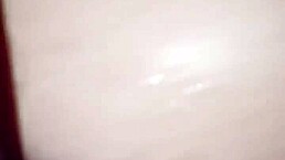 Mrs. Smith enjoys a friendly gathering with diverse company and a fun facial moment.