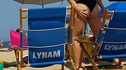 spying on this tiny 18+ beach slut in her bikini. her ass shakes as she walks candidly.