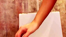 Sexy redhead takes gloryhole cock