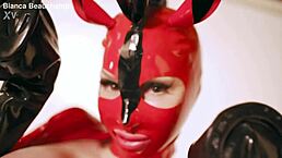 latex pony in corset and boots dominates with huge fake tits roleplay