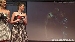 I watch this blonde amateur perform a lively dance routine on the stage with graceful moves.