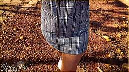 I forgot to wear panties today, the shaved pussy milf whispers while flashing upskirt in voyeur style.