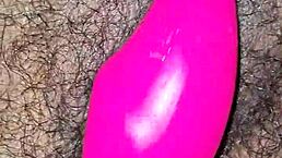 This very hot hairy Desi Indian bhabhi inserts a dildo into her juicy wet pussy. Her big natural tits bounce as she moans in orgasm.