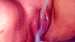 she's showing off her fat shaved pussy in the shower for joi enjoyment