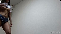 Tanned Big Tits Girl With No Bra Short T-Shirt And Denim Shorts Changes Into Micro Bikini During Fitness