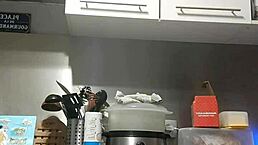 redhead girlfriend pleasures herself with dildo on kitchen counter as friend watches webcam solo