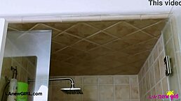 stunning blonde beauty refreshes in a relaxing shower session