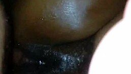 ebony milf's oily wet pussy glistens in casual scene