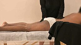 During a routine massage session, the hidden cam captured an unexpected happy ending with a handjob.