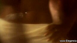 hot and sexy brunette milf strips naked in teasing dance with exotic glamour