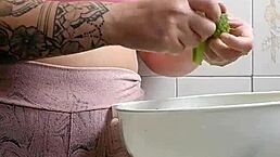 I put on tight shorts that split my swollen pussy to invite the neighbor for kitchen lunch.