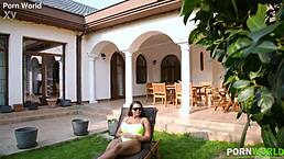 blowjob for the servant with this brunette cleaning lady showing huge fake tits outdoors