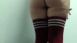 cheeky slut tries topless thigh highs sans panties in change room?