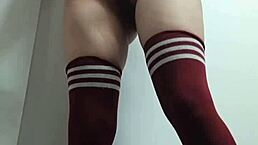 cheeky slut tries topless thigh highs sans panties in change room?