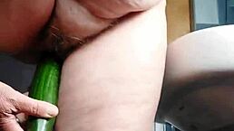 granny fucks hairy german pussy with thick cucumber deep