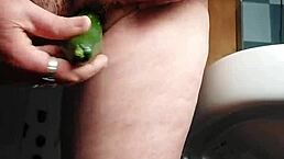 granny fucks hairy german pussy with thick cucumber deep