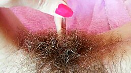 Hairy wet pussy with huge clit drips grool in closeup solo orgasm