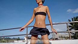 A sexy latina slut dances topless flashing her thong panties ass and small tits publicly