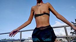 A sexy latina slut dances topless flashing her thong panties ass and small tits publicly