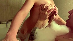 A lactating stepmom squirts milk on her stepson's face during play