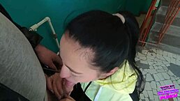 dare to watch teen slurping huge cock on public stairs?