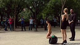 Bound slim brunette endures painful public outdoor bdsm fucking